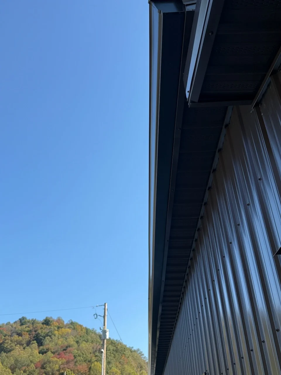 Professional seamless gutter installation by Big Willie's